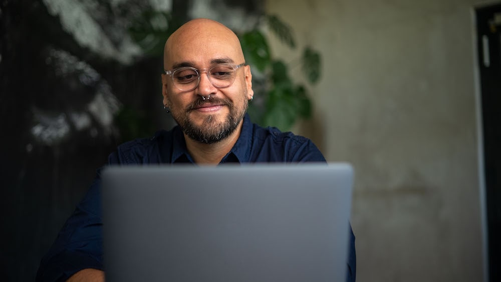 a product management student studying his program material